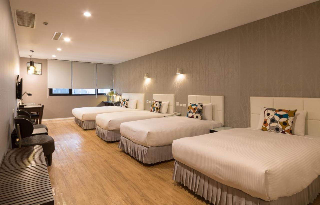 Just Enjoy Business Hotel Тайнань Экстерьер фото