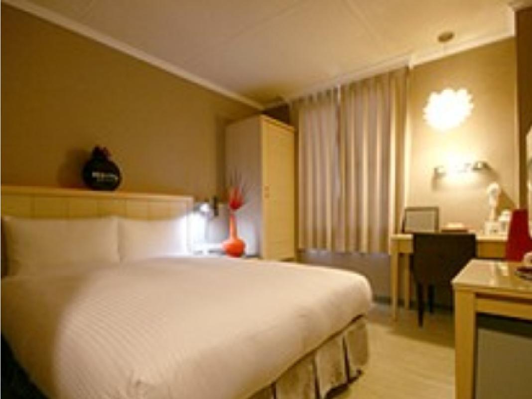 Just Enjoy Business Hotel Тайнань Экстерьер фото